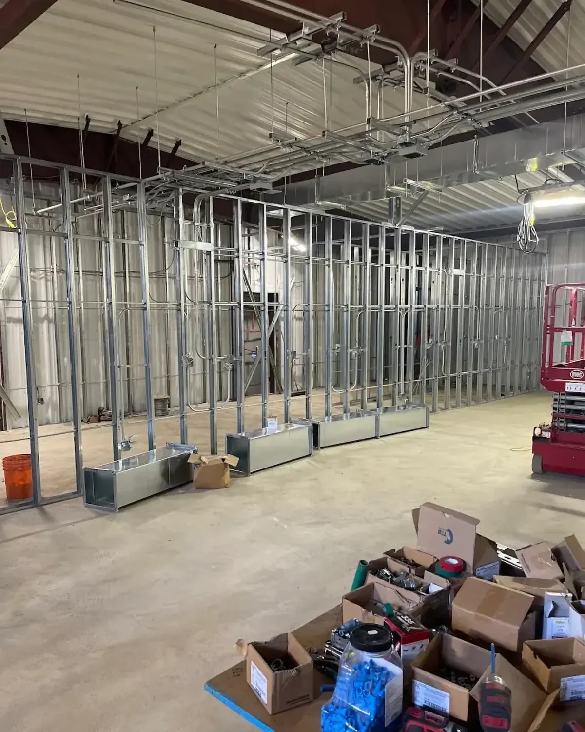 Steel stud walls with electrical boxes and conduit running through them